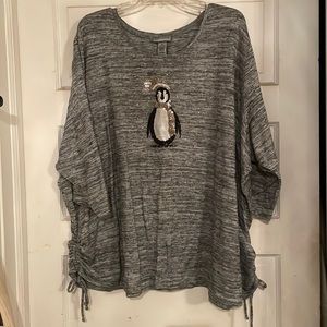 Catherine’s grey 3/4 sleeve penguin sweater